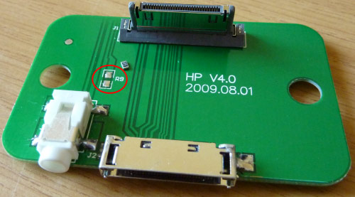 Location of the resistor to remove on the iPhone dock PCB